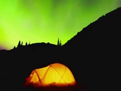 Glowing tent under the Northern Lights Stock Footage
