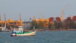Cargo ship sailing from open sea Stock Footage