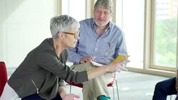 Woman leading group meeting Stock Footage
