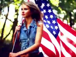 Girl running with the american flag. Stock Footage