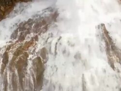 WS AERIAL ZI View of waterfall in landmannalaugur / Iceland Stock Footage