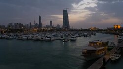 Kuwait, Kuwait City, Dar Al-Awadi Building and Minaret by Sharq Souk Stock Footage