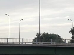 WS Two young girls running on bridge / Minneapolis, Minnesota, United States Stock Footage