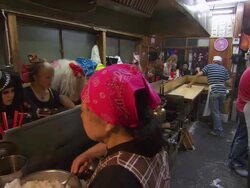 MS Group of young trendily dressed people eating, laughing and having fun in small restaurant / Tokyo, Japan Stock Footage