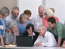 HD: Seniors Having Fun While Taking Computer Lessons Stock Footage