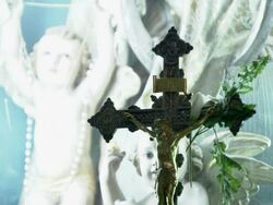  MS Metal crucifix in front of an image of angels AUDIO / Bethlehem, Palestine Stock Footage