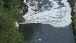 Storm water running into a wastewater collection canal in Ecatepec, Mexico. Stock Footage