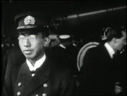 Japanese Crown Prince Hirohito smiles and talks to interviewers. News Clip