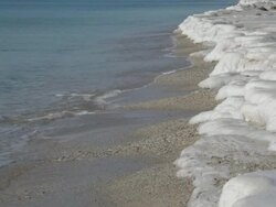Sea coastline covered with frozen wave and water Stock Footage
