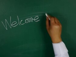 Written on the blackboard are welcome. Stock Footage