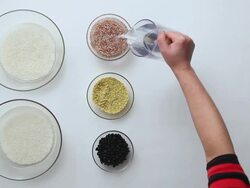 CU Shot of covering with water into ingredients of three other cereals / Seoul, South Korea Stock Footage