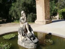 Botanical gardens (Orto Botanico di Palermo), view of the gardens with a fountain, with a sculpture in the middle, Palermo, Sicily Stock Footage