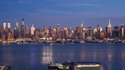Manhattan, view of the Empire State Building and Midtown Manhattan across the Hudson River, New York, United States of America - Time lapse Stock Footage