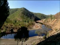 River curves around, Rio Tinto, Huelva, Andalusia, Spain Stock Footage