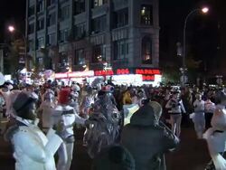 Parade participants walk down the parade route of the New York City Halloween Parade Stock Footage