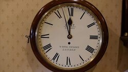 Hands Moving on a Wall Clock Face News Clip