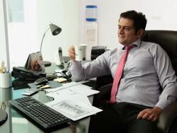 Businessman relaxing on the chair  Stock Footage