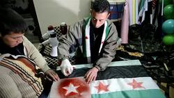 CLEAN: Syrian activists refurbish old flags for the Free Syrian Army News Clip