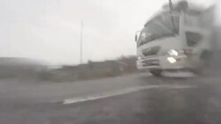 Car driving at rainy day - side view - 4K Stock Footage