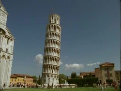 Leaning Tower of Pisa - MS whole tower, buildings in background, Tuscany Stock Footage