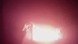 Slow Motion POV, firefighter climbs burning staircase, sprays water on fire Stock Footage
