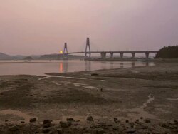 WS T/L View of Yeongheungdaegyo bridge at sunset (connect to Yeongheung Island and Sunjae Island) / Incheon, South Korea Stock Footage