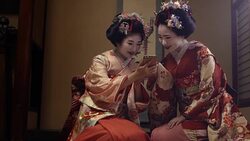 Geisha Maiko Using Mobile  UHD 4K Stock Footage