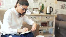 Businesswoman taking notes. Stock Footage