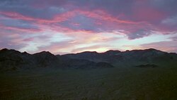 Death Valley National Park Aerial Fly-Over through Canyon Reveal of Death Valley Stock Footage