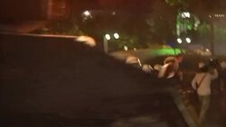 Riot police try to disperse thousands of protesters with water cannons Instructional Video