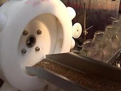 Glass jar and caraway spice on conveyor line Stock Footage