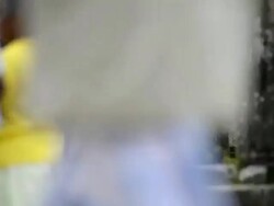 Polonnaruwa Ancient City, tourists passing the Buddha at the Tooth Relic Chamber in Polonnaruwa Quadrangle, Sri Lanka, Asia  Stock Footage