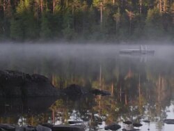 MS PAN Shot of Early morning fog on Long Pond with wildness / Maine, United States Stock Footage