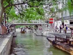MS View of tour boats on river in village of Zhujiajiao / Shanghai,  China Stock Footage