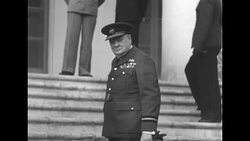 Churchill and Stalin waiting around on porch of Soviet Embassy at Tehran Conference during World War II News Clip