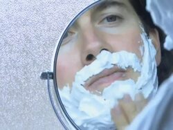 Man wet-shaving, UK Stock Footage
