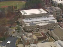 WS AERIAL ZI Shot of Athletic Centre and car stop in front of building / North Carolina, United States Stock Footage