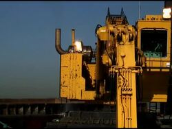 Construction Digger Dredges, Digs, Scoops Mud Stock Footage