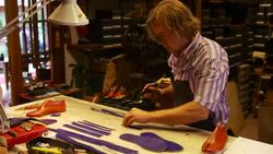 the shoemaker make a shoe Stock Footage