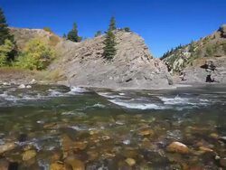 River flowing through Mountain canyon Stock Footage