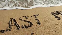 LAST MINUTE written in sand Stock Footage