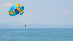 parasailing over the sea Stock Footage