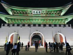 MS T/L People roaming at Gwanghwamun Gate (Gyeongbokgung Royal Palace's Entrance Gate) at Night / Seoul, South Korea Stock Footage