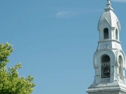  The pinion of white church with blue sky Stock Footage