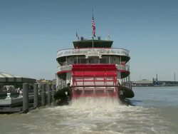 MS Steamboat paddle churning waters / New Orleans, Louisiana, United States Stock Footage