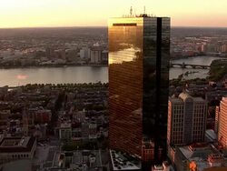LOW AERIAL, Boston downtown buildings at sunset, Massachusetts, USA Stock Footage
