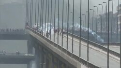 Clashes on bridge after police clear protesters from nearby Rabaah Al Adawiya pro-Morsi sit-in News Clip