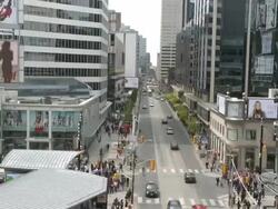 WS T/L Multiple direction crosswalk at Yonge and Dundas square / Toronto, Ontario, Canada Stock Footage