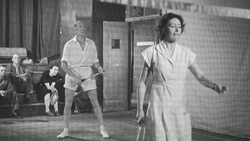 1948 People playing doubles tennis / United Kingdom Stock Footage