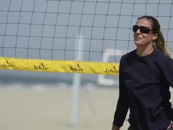 ECU CU of female beach volleyball players team warming up, peppering and rallying with the ball. Stock Footage